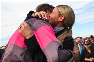 WARRNAMBOOL, AUSTRALIA - MAY 06: Clayton Douglas is congratulated by his partner Jamie kah after riding Gold Medals to win Race 7, the Grand Annual Steeplechase, on Grand Annual Day during the Warrnambool Jumps Carnival at Warrnambool Racing Club on May 06, 2021 in Warrnambool, Australia. (Photo by Vince Caligiuri/Getty Images)