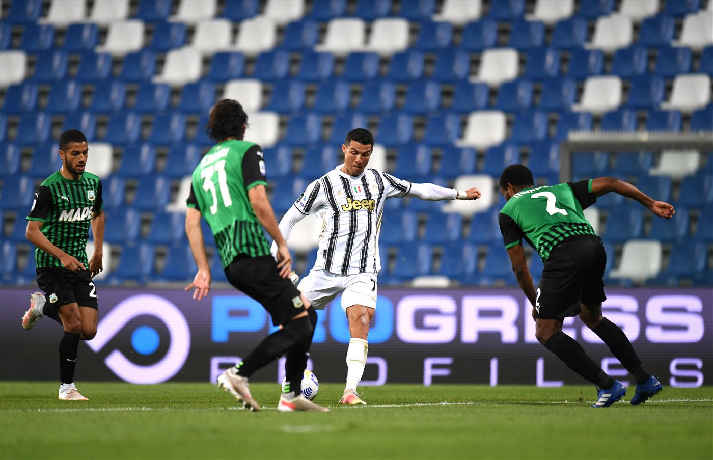 REGGIO NELL'EMILIA, ITALY - MAY 12: Cristiano Ronaldo of Juventus scores their side's second goal during the Serie A match between US Sassuolo and Juventus at Mapei Stadium - Città del Tricolore on May 12, 2021 in Reggio nell'Emilia, Italy. Sporting stadiums around Italy remain under strict restrictions due to the Coronavirus Pandemic as Government social distancing laws prohibit fans inside venues resulting in games being played behind closed doors.  (Getty Images)