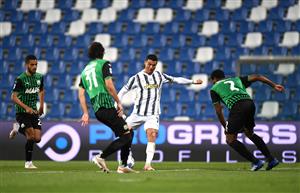 REGGIO NELL'EMILIA, ITALY - MAY 12: Cristiano Ronaldo of Juventus scores their side's second goal during the Serie A match between US Sassuolo and Juventus at Mapei Stadium - Città del Tricolore on May 12, 2021 in Reggio nell'Emilia, Italy. Sporting stadiums around Italy remain under strict restrictions due to the Coronavirus Pandemic as Government social distancing laws prohibit fans inside venues resulting in games being played behind closed doors. (Getty Images)