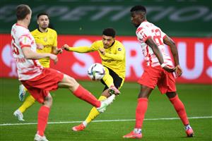 Dortmund's English midfielder Jadon Sancho (C) shoots to score the 0-1 during the German Cup (DFB Pokal) final football match RB Leipzig v BVB Borussia Dortmund, in Berlin on May 13, 2021. (Getty Images)