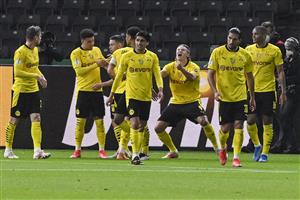 Dortmund's Norwegian forward Erling Braut Haaland (C) celebrates with teammates scoring during the German Cup (DFB Pokal) final football match RB Leipzig v BVB Borussia Dortmund, in Berlin on May 13, 2021. (Getty Images)