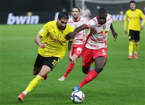 BERLIN, GERMANY - MAY 13: Emre Can (L) of Borussia Dortmund is challenged by Dayot Upamecano of RB Leipzig during the DFB Cup final match between RB Leipzig and Borussia Dortmund at Olympic Stadium on May 13, 2021 in Berlin, Germany. (Getty Images)