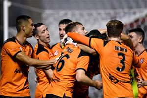 BRISBANE, AUSTRALIA - MAY 25: Alex Parsons of the Roar is congratulated by team mates after scoring a goal during the A-League match between the Brisbane Roar and Melbourne City at Moreton Daily Stadium, on May 25, 2021, in Brisbane, Australia. (Getty Images)