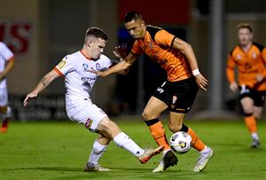 BRISBANE, AUSTRALIA - MAY 25: Joe Champness of the Roar takes on the defence of Scott Galloway of Melbourne City during the A-League match between the Brisbane Roar and Melbourne City at Moreton Daily Stadium, on May 25, 2021, in Brisbane, Australia. (Getty Images)