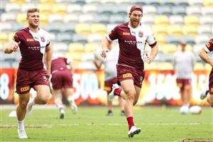 TOWNSVILLE, AUSTRALIA - JUNE 08: Jai Arrow and Christian Welch laugh as they race during a Queensland Maroons State of Origin training session at Queensland Country Bank Stadium on June 08, 2021 in Townsville, Australia. (Photo by Mark Kolbe/Getty Images)