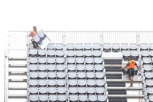 TOWNSVILLE, AUSTRALIA - JUNE 08: Workmen add extra seating the temporary grandstand before a Queensland Maroons State of Origin training session at Queensland Country Bank Stadium on June 08, 2021 in Townsville, Australia. (Photo by Mark Kolbe/Getty Images)