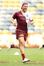 TOWNSVILLE, AUSTRALIA - JUNE 08: Christian Welch laughs as he runs during a Queensland Maroons State of Origin training session at Queensland Country Bank Stadium on June 08, 2021 in Townsville, Australia. (Photo by Mark Kolbe/Getty Images)