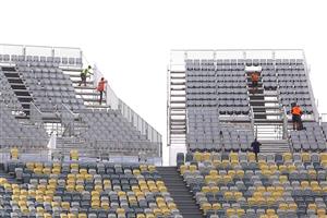 TOWNSVILLE, AUSTRALIA - JUNE 08: Workmen add extra seating the temporary grandstand before a Queensland Maroons State of Origin training session at Queensland Country Bank Stadium on June 08, 2021 in Townsville, Australia. (Photo by Mark Kolbe/Getty Images)