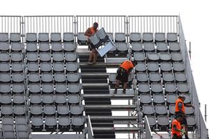 TOWNSVILLE, AUSTRALIA - JUNE 08: Workmen add extra seating the temporary grandstand before a Queensland Maroons State of Origin training session at Queensland Country Bank Stadium on June 08, 2021 in Townsville, Australia. (Photo by Mark Kolbe/Getty Images)