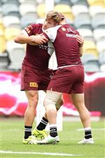 TOWNSVILLE, AUSTRALIA - JUNE 08: Harry Grant and AJ Brimson wrestle during a Queensland Maroons State of Origin training session at Queensland Country Bank Stadium on June 08, 2021 in Townsville, Australia. (Photo by Mark Kolbe/Getty Images)