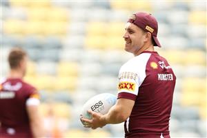 TOWNSVILLE, AUSTRALIA - JUNE 08: Cameron Munster shares a joke with a team mate during a Queensland Maroons State of Origin training session at Queensland Country Bank Stadium on June 08, 2021 in Townsville, Australia. (Photo by Mark Kolbe/Getty Images)