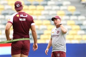 TOWNSVILLE, AUSTRALIA - JUNE 08: Queensland Maroons coach Paul Green speaks to Christian Welch during a Queensland Maroons State of Origin training session at Queensland Country Bank Stadium on June 08, 2021 in Townsville, Australia. (Photo by Mark Kolbe/Getty Images)