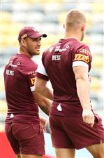 TOWNSVILLE, AUSTRALIA - JUNE 08: Valentine Holmes speaks to Coen Hess during a Queensland Maroons State of Origin training session at Queensland Country Bank Stadium on June 08, 2021 in Townsville, Australia. (Photo by Mark Kolbe/Getty Images)