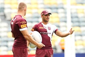 TOWNSVILLE, AUSTRALIA - JUNE 08: Valentine Holmes speaks to Coen Hess during a Queensland Maroons State of Origin training session at Queensland Country Bank Stadium on June 08, 2021 in Townsville, Australia. (Photo by Mark Kolbe/Getty Images)