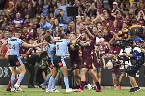 TOWNSVILLE, AUSTRALIA - JUNE 09: Players scuffle at half-time during game one of the 2021 State of Origin series between the New South Wales Blues and the Queensland Maroons at Queensland Country Bank Stadium on June 09, 2021 in Townsville, Australia. (Photo by Ian Hitchcock/Getty Images)