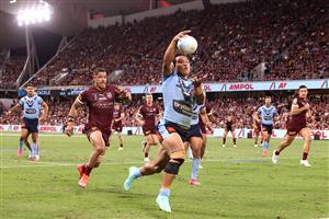 TOWNSVILLE, AUSTRALIA - JUNE 09: Brian To'o of the Blues is tackled during game one of the 2021 State of Origin series between the New South Wales Blues and the Queensland Maroons at Queensland Country Bank Stadium on June 09, 2021 in Townsville, Australia. (Photo by Mark Kolbe/Getty Images)