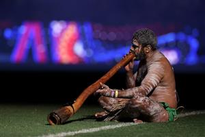 TOWNSVILLE, AUSTRALIA - JUNE 09: Indigenous dancers perform before game one of the 2021 State of Origin series between the New South Wales Blues and the Queensland Maroons at Queensland Country Bank Stadium on June 09, 2021 in Townsville, Australia. (Photo by Mark Kolbe/Getty Images)