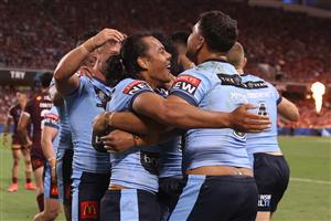 TOWNSVILLE, AUSTRALIA - JUNE 09: Jerome Luai of the Blues celebrates with team mates after a try scored by Brian To'o of the Blues during game one of the 2021 State of Origin series between the New South Wales Blues and the Queensland Maroons at Queensland Country Bank Stadium on June 09, 2021 in Townsville, Australia. (Photo by Mark Kolbe/Getty Images)
