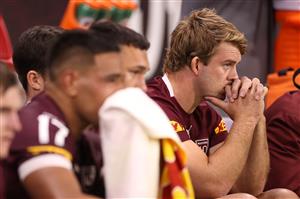 TOWNSVILLE, AUSTRALIA - JUNE 09: Christian Welch of the Maroons watches the match from the bench during game one of the 2021 State of Origin series between the New South Wales Blues and the Queensland Maroons at Queensland Country Bank Stadium on June 09, 2021 in Townsville, Australia. (Photo by Mark Kolbe/Getty Images)