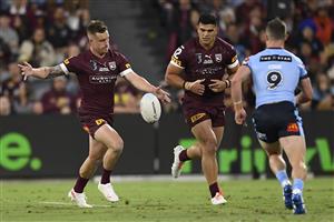 TOWNSVILLE, AUSTRALIA - JUNE 09: Cameron Munster of the Maroons kicks the ball during game one of the 2021 State of Origin series between the New South Wales Blues and the Queensland Maroons at Queensland Country Bank Stadium on June 09, 2021 in Townsville, Australia. (Photo by Ian Hitchcock/Getty Images)