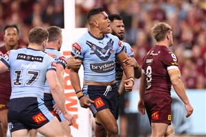 TOWNSVILLE, AUSTRALIA - JUNE 09: Daniel Saifiti of the Blues celebrates with team mates after scoring a try during game one of the 2021 State of Origin series between the New South Wales Blues and the Queensland Maroons at Queensland Country Bank Stadium on June 09, 2021 in Townsville, Australia. (Photo by Mark Kolbe/Getty Images)