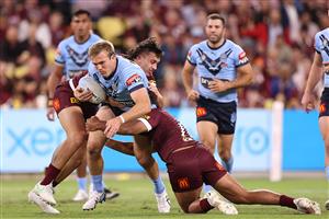 TOWNSVILLE, AUSTRALIA - JUNE 09: Jake Trbojevic of the Blues is tackled during game one of the 2021 State of Origin series between the New South Wales Blues and the Queensland Maroons at Queensland Country Bank Stadium on June 09, 2021 in Townsville, Australia. (Photo by Mark Kolbe/Getty Images)