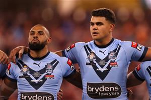 TOWNSVILLE, AUSTRALIA - JUNE 09: (L-R) Josh Addo-Carr of the Blues and Latrell Mitchell of the Blues sing the national anthem before game one of the 2021 State of Origin series between the New South Wales Blues and the Queensland Maroons at Queensland Country Bank Stadium on June 09, 2021 in Townsville, Australia. (Photo by Mark Kolbe/Getty Images)