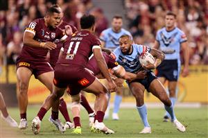 TOWNSVILLE, AUSTRALIA - JUNE 09: Josh Addo-Carr of the Blues is tackled during game one of the 2021 State of Origin series between the New South Wales Blues and the Queensland Maroons at Queensland Country Bank Stadium on June 09, 2021 in Townsville, Australia. (Photo by Mark Kolbe/Getty Images)