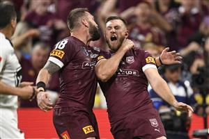 TOWNSVILLE, AUSTRALIA - JUNE 09: Kurt Capewell of the Maroons celebrates with team mates after scoring a try during game one of the 2021 State of Origin series between the New South Wales Blues and the Queensland Maroons at Queensland Country Bank Stadium on June 09, 2021 in Townsville, Australia. (Photo by Ian Hitchcock/Getty Images)