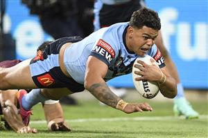 TOWNSVILLE, AUSTRALIA - JUNE 09: Latrell Mitchell of the Blues scores a try during game one of the 2021 State of Origin series between the New South Wales Blues and the Queensland Maroons at Queensland Country Bank Stadium on June 09, 2021 in Townsville, Australia. (Photo by Ian Hitchcock/Getty Images)