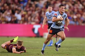 TOWNSVILLE, AUSTRALIA - JUNE 09: Nathan Cleary of the Blues makes a break during game one of the 2021 State of Origin series between the New South Wales Blues and the Queensland Maroons at Queensland Country Bank Stadium on June 09, 2021 in Townsville, Australia. (Photo by Mark Kolbe/Getty Images)