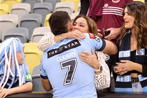TOWNSVILLE, AUSTRALIA - JUNE 09: Nathan Cleary of the Blues hugs his mother after winning game one of the 2021 State of Origin series between the New South Wales Blues and the Queensland Maroons at Queensland Country Bank Stadium on June 09, 2021 in Townsville, Australia. (Photo by Mark Kolbe/Getty Images)