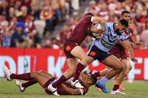 TOWNSVILLE, AUSTRALIA - JUNE 09: Payne Haas of the Blues is tackled during game one of the 2021 State of Origin series between the New South Wales Blues and the Queensland Maroons at Queensland Country Bank Stadium on June 09, 2021 in Townsville, Australia. (Photo by Mark Kolbe/Getty Images)