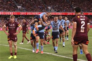 TOWNSVILLE, AUSTRALIA - JUNE 09: Jerome Luai of the Blues and Tariq Sims of the Blues celebrate after a try scored by Brian To'o of the Blues during game one of the 2021 State of Origin series between the New South Wales Blues and the Queensland Maroons at Queensland Country Bank Stadium on June 09, 2021 in Townsville, Australia. (Photo by Mark Kolbe/Getty Images)