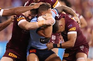 TOWNSVILLE, AUSTRALIA - JUNE 09: Tariq Sims of the Blues is tackled during game one of the 2021 State of Origin series between the New South Wales Blues and the Queensland Maroons at Queensland Country Bank Stadium on June 09, 2021 in Townsville, Australia. (Photo by Mark Kolbe/Getty Images)