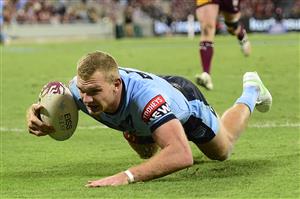 TOWNSVILLE, AUSTRALIA - JUNE 09: Tom Trbojevic of the Blues scores a try during game one of the 2021 State of Origin series between the New South Wales Blues and the Queensland Maroons at Queensland Country Bank Stadium on June 09, 2021 in Townsville, Australia. (Photo by Ian Hitchcock/Getty Images)