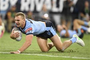 TOWNSVILLE, AUSTRALIA - JUNE 09: Tom Trbojevic of the Blues scores a try during game one of the 2021 State of Origin series between the New South Wales Blues and the Queensland Maroons at Queensland Country Bank Stadium on June 09, 2021 in Townsville, Australia. (Photo by Ian Hitchcock/Getty Images)