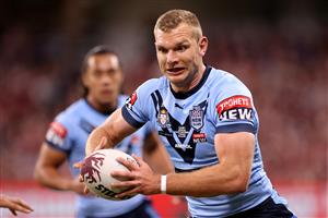 TOWNSVILLE, AUSTRALIA - JUNE 09: Tom Trbojevic of the Blues runs the ball during game one of the 2021 State of Origin series between the New South Wales Blues and the Queensland Maroons at Queensland Country Bank Stadium on June 09, 2021 in Townsville, Australia. (Photo by Mark Kolbe/Getty Images)