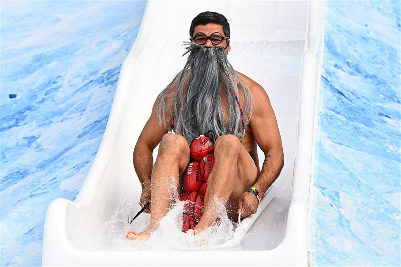 MELBOURNE, AUSTRALIA - JUNE 14: Jeff Farmer goes down the slide during the Big Freeze slide at Melbourne Cricket Ground on June 14, 2021 in Melbourne, Australia. The annual event aims to raise funds to fight MND as part of the Queen's Birthday AFL match, this year held at the SCG due to Covid19 protocols in Melbourne preventing crowd from attending this year's event. (Photo by Quinn Rooney/Getty Images)