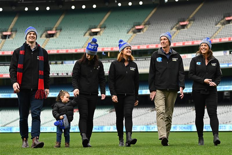 MELBOURNE, AUSTRALIA - JUNE 14: (L-R) Ben Daniher, Rosie McKenna, Lauren Daniher, Jan Daniher, Neale Daniher and Bec Daniher during the Big Freeze slide at Melbourne Cricket Ground on June 14, 2021 in Melbourne, Australia. The annual event aims to raise funds to fight MND as part of the Queen's Birthday AFL match, this year held at the SCG due to Covid19 protocols in Melbourne preventing crowd from attending this year's event. (Photo by Quinn Rooney/Getty Images)
