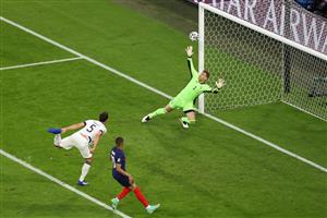 TOPSHOT - Germany's defender Mats Hummels (L) deflects the ball to score past Germany's goalkeeper Manuel Neuer for the first goal during the UEFA EURO 2020 Group F football match between France and Germany at the Allianz Arena in Munich on June 15, 2021. (Getty Images)