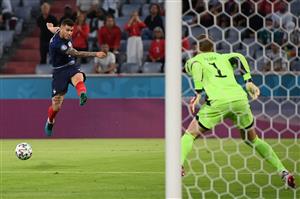 France's defender Lucas Hernandez (L) attempts a shot, before it was deflected into the goal, during the UEFA EURO 2020 Group F football match between France and Germany at the Allianz Arena in Munich on June 15, 2021. (Getty Images)