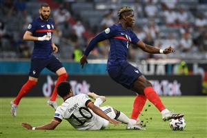 France's midfielder Paul Pogba (R) is fouled by Germany's midfielder Serge Gnabry during the UEFA EURO 2020 Group F football match between France and Germany at the Allianz Arena in Munich on June 15, 2021. (Getty Images)
