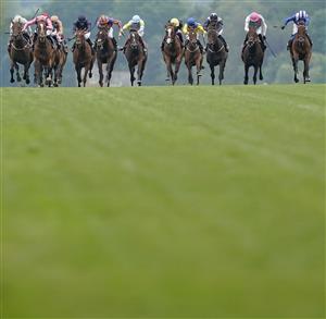 ASCOT, ENGLAND - JUNE 17: Robert Havlin riding Loving Dream (L, pink) win The Ribblesdale Stakes on Day Three of the Royal Ascot Meeting at Ascot Racecourse on June 17, 2021 in Ascot, England. A total of twelve thousand racegoers made up of owners and the public are permitted to attend the meeting due to it being an Events Research Programme (ERP) set up by the Government due to the Coronavirus pandemic. (Photo by Alan Crowhurst/Getty Images)