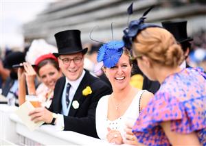 ASCOT, ENGLAND - JUNE 17: Racegoers look on on Day Three of the Royal Ascot Meeting at Ascot Racecourse on June 17, 2021 in Ascot, England. A total of twelve thousand racegoers made up of Owners and the Public are permitted to attend the meeting due to it being an Events Research Programme (ERP) set up by the government due to the Coronavirus Pandemic. (Photo by Harry Trump/Getty Images)