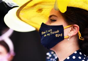 ASCOT, ENGLAND - JUNE 17: A racegoer looks on on Day Three of the Royal Ascot Meeting at Ascot Racecourse on June 17, 2021 in Ascot, England. A total of twelve thousand racegoers made up of Owners and the Public are permitted to attend the meeting due to it being an Events Research Programme (ERP) set up by the government due to the Coronavirus Pandemic. (Photo by Harry Trump/Getty Images)