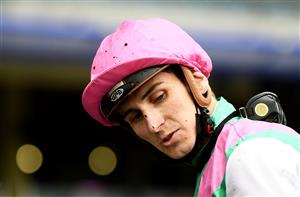ASCOT, ENGLAND - JUNE 17: Hector Crouch on board Surefire looks on after winning the King George V Stakes on Day Three of the Royal Ascot Meeting at Ascot Racecourse on June 17, 2021 in Ascot, England. A total of twelve thousand racegoers made up of Owners and the Public are permitted to attend the meeting due to it being an Events Research Programme (ERP) set up by the government due to the Coronavirus Pandemic. (Photo by Harry Trump/Getty Images)