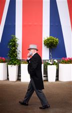 ASCOT, ENGLAND - JUNE 17: A racegoer looks on on Day Three of the Royal Ascot Meeting at Ascot Racecourse on June 17, 2021 in Ascot, England. A total of twelve thousand racegoers made up of Owners and the Public are permitted to attend the meeting due to it being an Events Research Programme (ERP) set up by the government due to the Coronavirus Pandemic. (Photo by Harry Trump/Getty Images)
