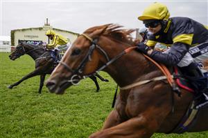 ASCOT, ENGLAND - JUNE 17: Paul Hanagan riding Perfect Power (yellow) win The Norfolk Stakes on Day Three of the Royal Ascot Meeting at Ascot Racecourse on June 17, 2021 in Ascot, England. A total of twelve thousand racegoers made up of owners and the public are permitted to attend the meeting due to it being an Events Research Programme (ERP) set up by the Government due to the Coronavirus pandemic. (Photo by Alan Crowhurst/Getty Images)