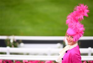 ASCOT, ENGLAND - JUNE 17: A racegoer looks on on Day Three of the Royal Ascot Meeting at Ascot Racecourse on June 17, 2021 in Ascot, England. A total of twelve thousand racegoers made up of Owners and the Public are permitted to attend the meeting due to it being an Events Research Programme (ERP) set up by the government due to the Coronavirus Pandemic. (Photo by Harry Trump/Getty Images)